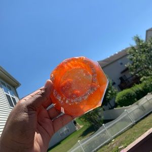 Orange sunburnt resin ashtray